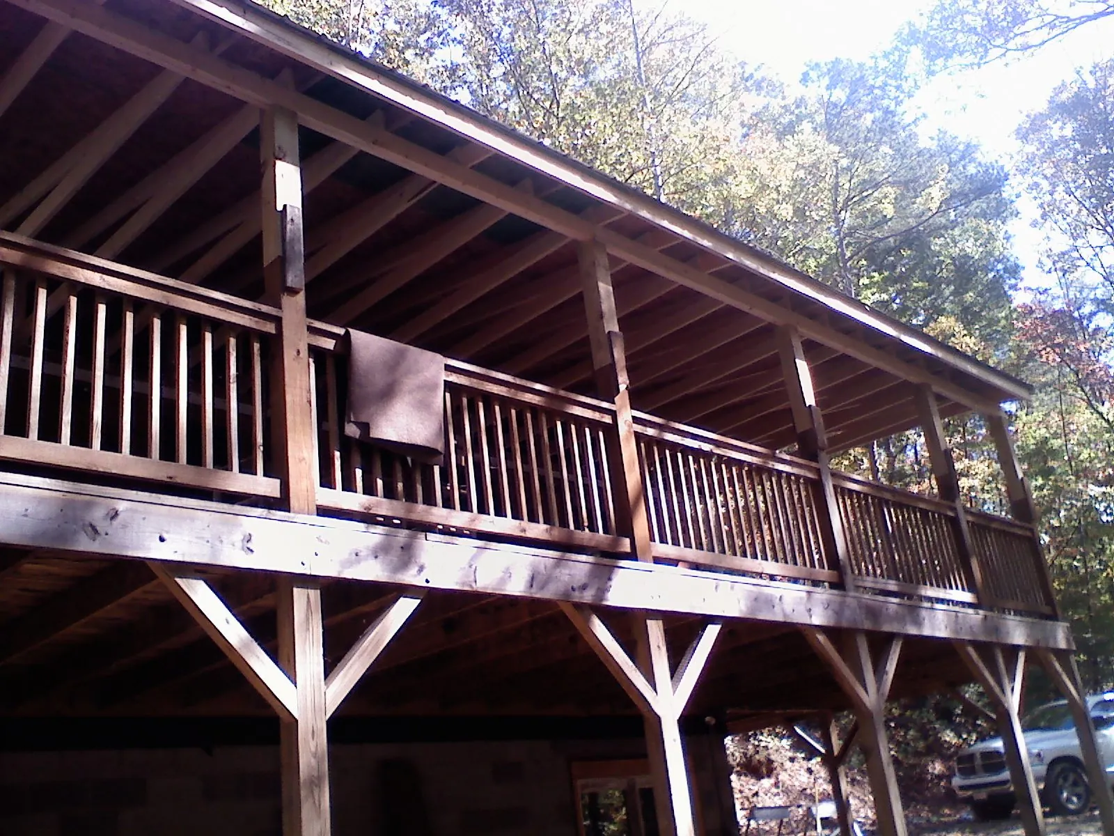 Timber framing under a new elevated porch and deck — Roof Leak Repair in Tidewater by Roofing Brothers